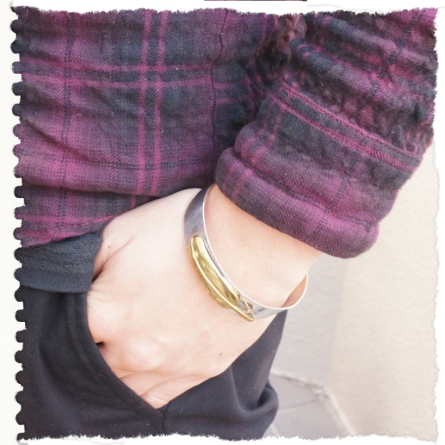 シルバー925製ゴールドカラーの羽根が神秘的 フェザーモチーフ