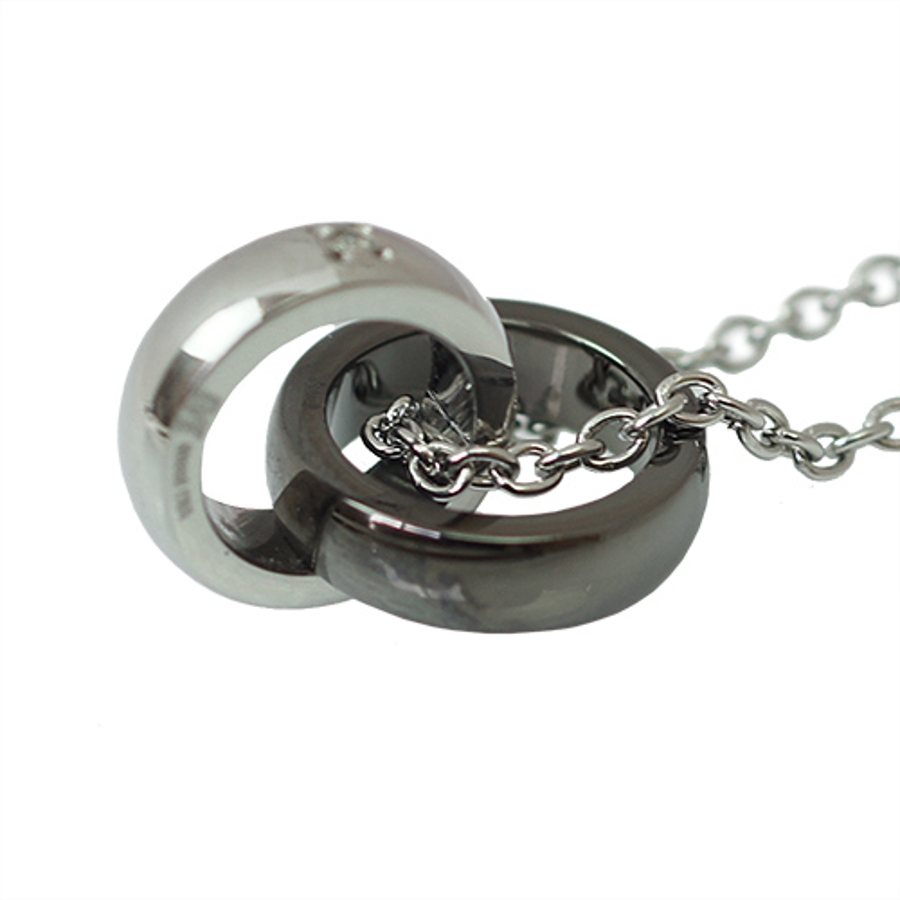 サージカルステンレスペアネックレス リングが2つ重なった