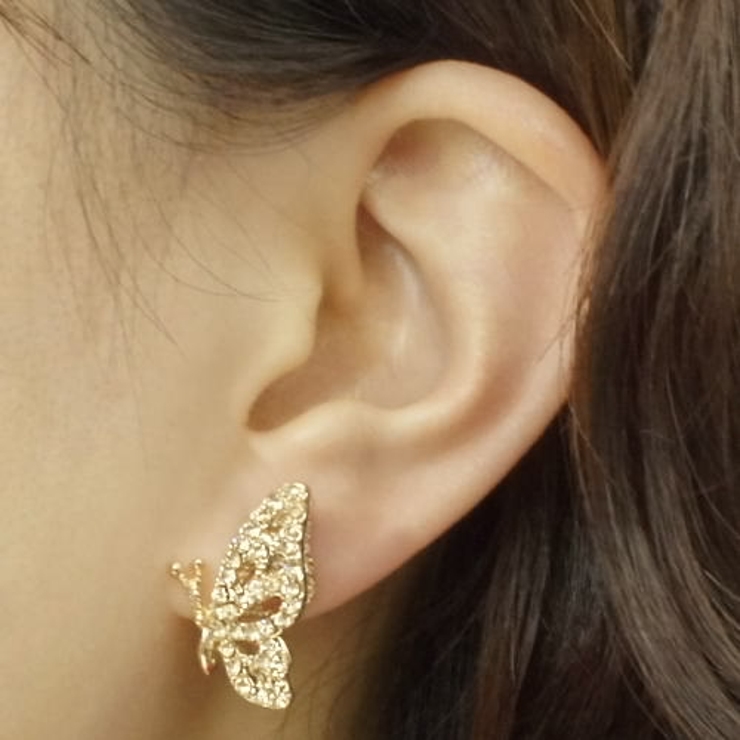 横向き蝶々が華麗なピアス シトリンオレンジカラーのラインストーンが