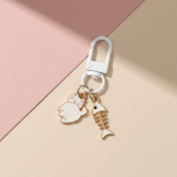 ホワイト | 【7291】ふりむきネコチャーム | SneepDip